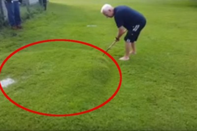 W swoim ogrodzie pod trawnikiem zauważył wielką bańkę! Zdecydował się czymś ją przebić!