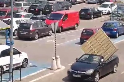 Mistrz przewożenia płotu z supermarketu za pomocą Opla